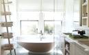 Полотенца в ванной: 14 нестандартных идей для хранения